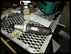 cigarette lighter pushed through bezel-grinder.jpg