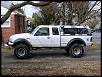 My redneck "brute force" spring spacer for my front coils.-newstance.jpg